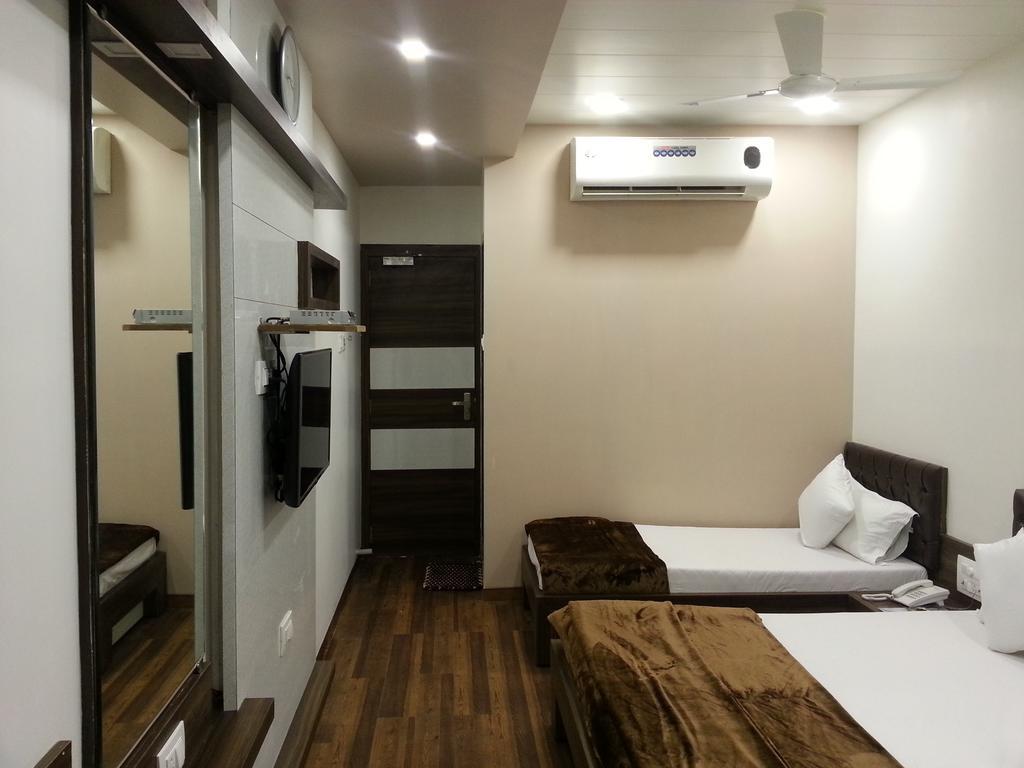 Hotel Oasis Bombay Habitación foto