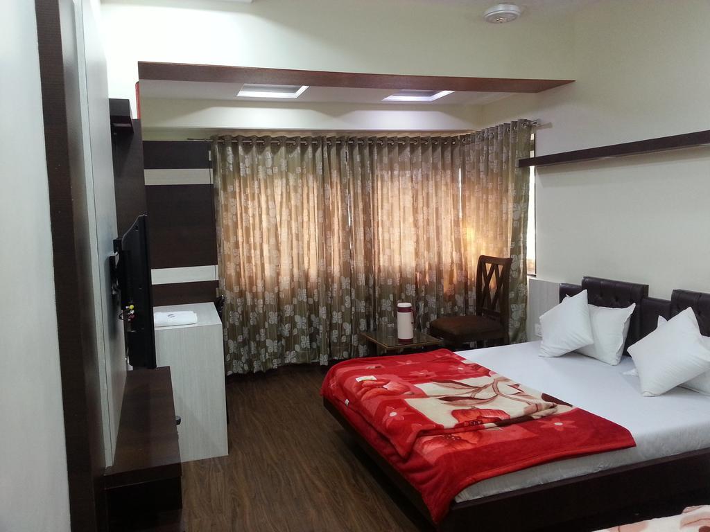 Hotel Oasis Bombay Habitación foto