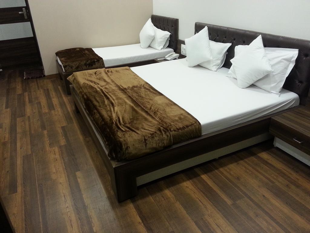 Hotel Oasis Bombay Habitación foto